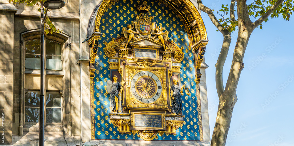 Obraz premium Golden clock of the Tour de l'Horloge, a clock tower in Paris, France