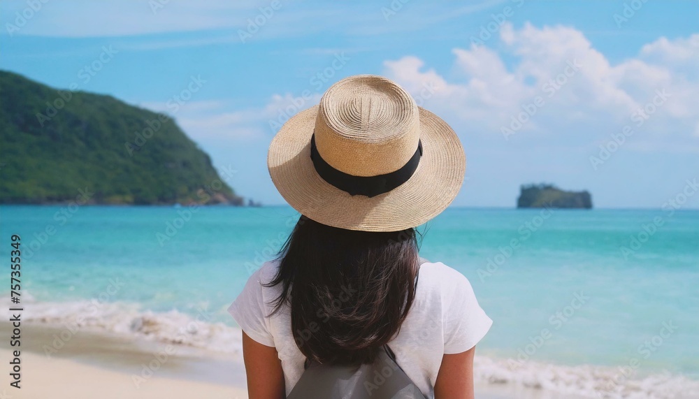 Traveller woman in hat looking on tropical beach, rear view