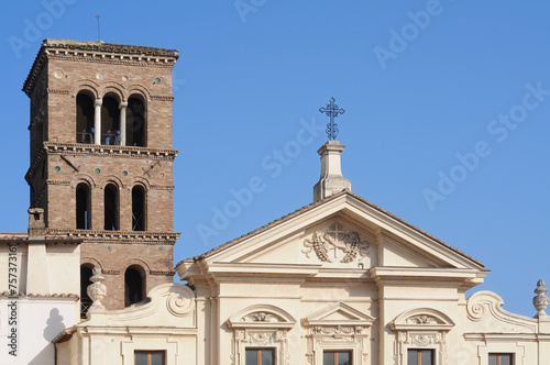 San Bartolomeo all' Isola basilica with campanile on Tiber Island in Rome, with blue sky