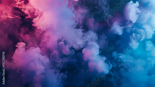 Colorful clouds of smoke on a black background. Abstract background ,Dense multicolored smoke of red and blue colors on a black isolated background. Background from the smoke of vape