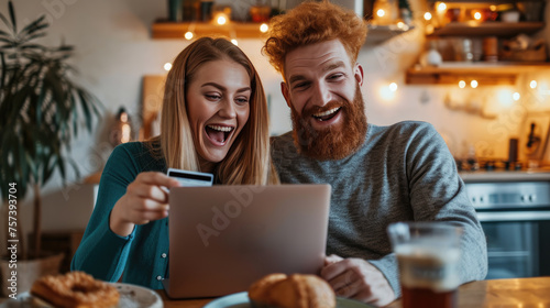 Wallpaper Mural Joyful couple engaged in online shopping Torontodigital.ca