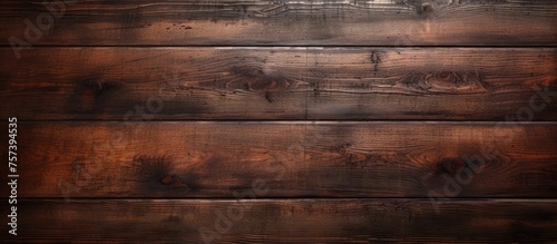 A close up of a brown hardwood plank table with a wood stain pattern on a blurred background, showcasing the beauty of wood flooring