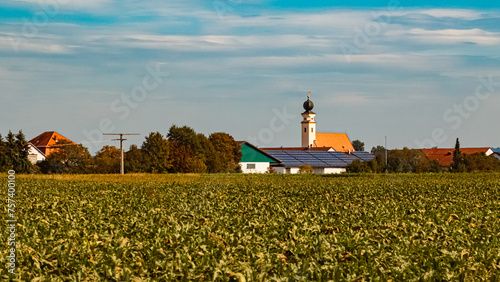 Autumn or indian summer view with a church near Haardorf, Osterhofen, Danube, Deggendorf, Bavaria, Germany photo