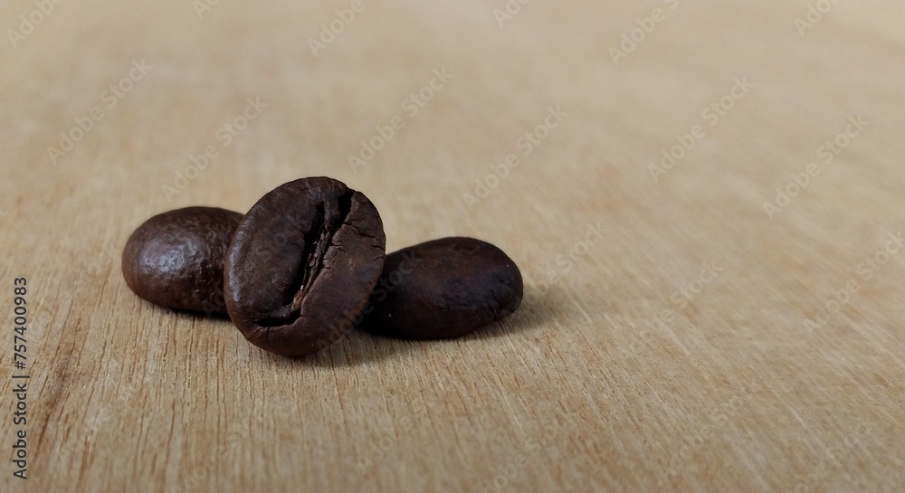 Coffee beans background. Close up of roasted coffee beans. Coffee beans background. Close up of roasted coffee beans.