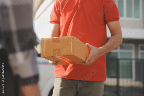 Wallpaper Mural Asian delivery express courier young man use giving boxes to woman customer he wearing protective face mask at front home Torontodigital.ca