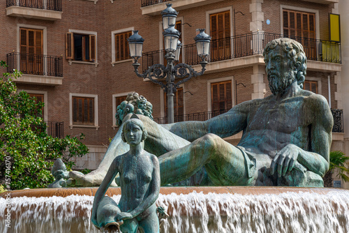 Turia Fountain in the Plaza de la Virgen Valencia Spain photo