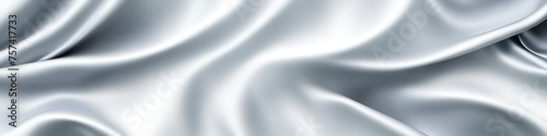 Silver panoramic silk background with blurred satin wavy texture.