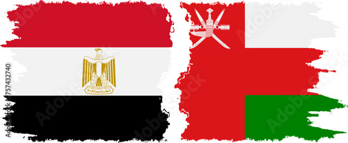 Oman and Egypt grunge flags connection vector
