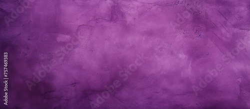 A close up of a purple background with a blurred effect, resembling tints and shades of violet, magenta, and electric blue. The skylike pattern includes cumulus clouds in various shades of pink
