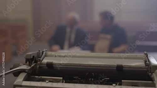 Court room transcript being typed by a stenographer photo