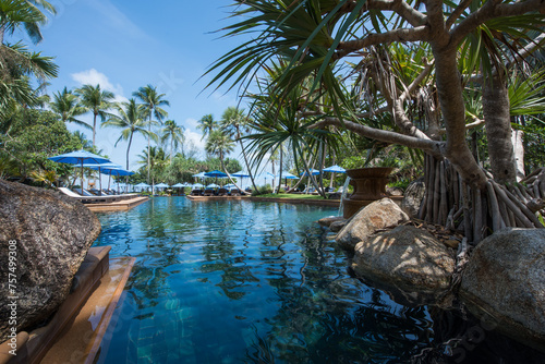 Outdoor swimming pool at a hotel in Thailand photo