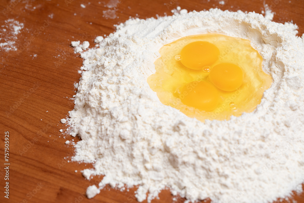 Preparing Dough with Eggs and Flour Preparing Dough with Eggs and Flour