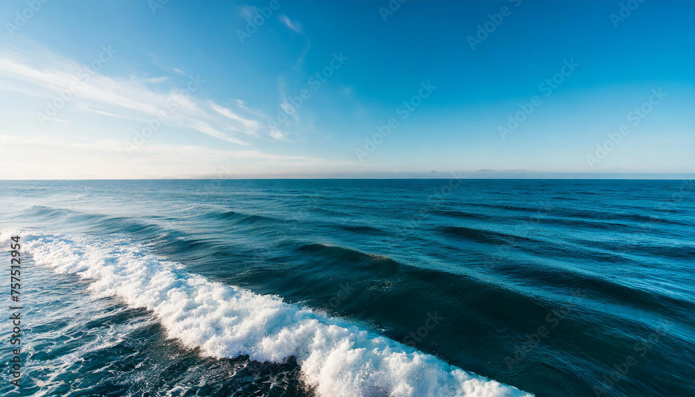 Sea waves. Deep blue ocean water. Sunny natural landscape. Travel and tourism