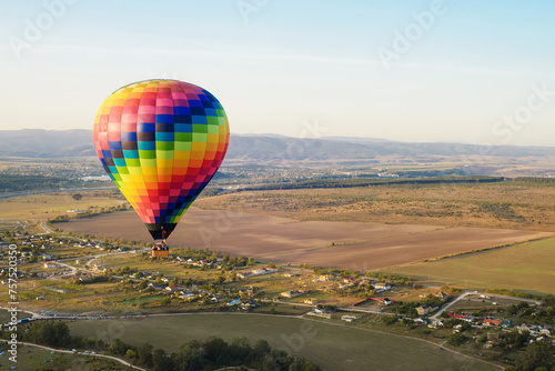 Multi-colored balloon soar in the sky over Crimea