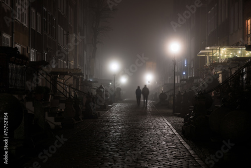 Foggy scenery of the Mariacka street in Gdansk. Poland photo