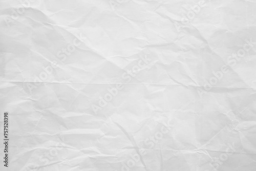 White paper sheet texture background with crumpled wrinkled and rough pattern, empty blank paper page material for any design photo