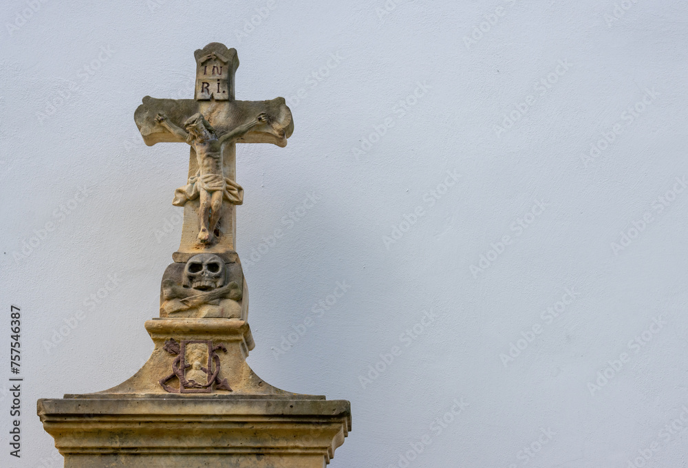 Historical cross of a tomb, church in Dlouhomilov, Czechia