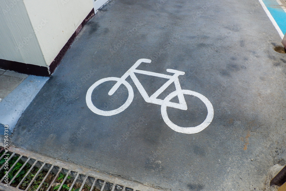 Road sign bicycle path on the road,Traffic sign for exclusive lane for bicycles in the city,bicycle sign on asphalt,Bicycle path, road marking element with graphic bicycle sign,Space for text. Road sign bicycle path on the road,Traffic sign for exclusive lane for bicycles in the city,bicycle sign on asphalt,Bicycle path, road marking element with graphic bicycle sign,Space for text.