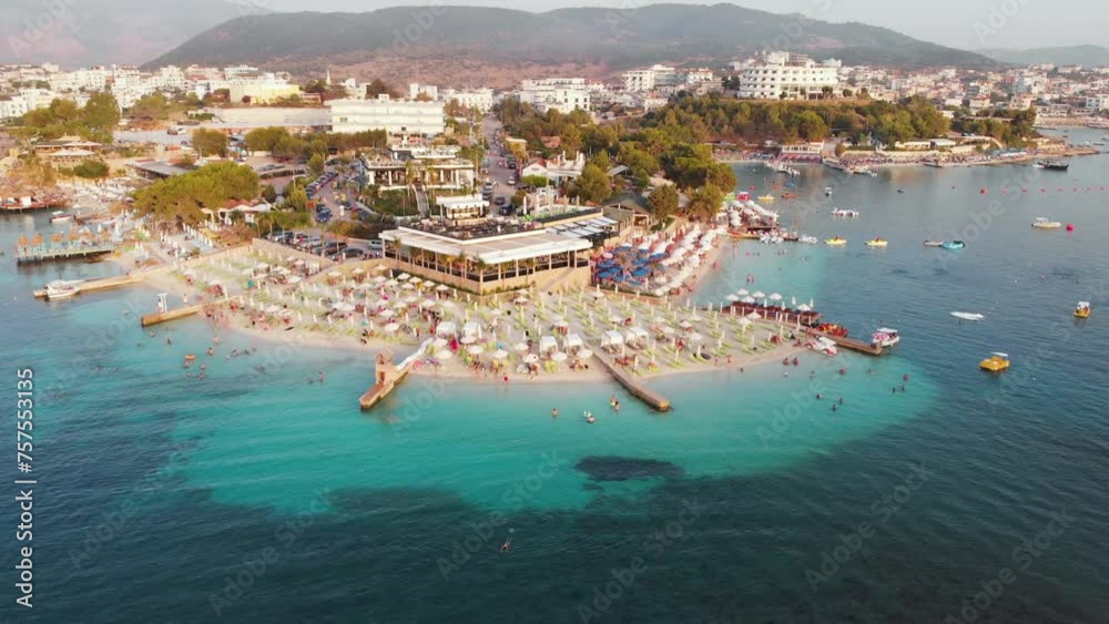 Amazing peninsula adorned with elegant hotels and beaches of azure Ionic sea of Ksamil beach Albania