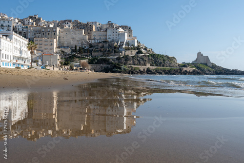 Fototapeta Naklejka Na Ścianę i Meble -  View on sandy beach and sea water in medieval small touristic coastal town Sperlonga and sea shore, Latina, Italy