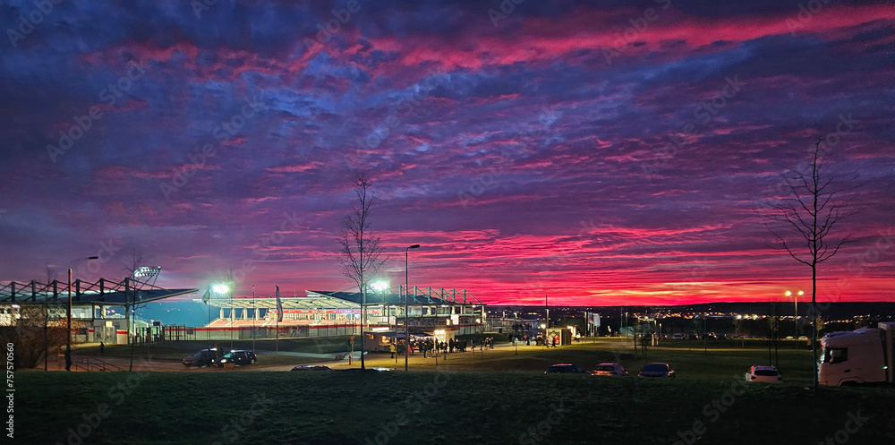 View of the soccer stadium in Zwickau during a spectacular sunset before the FSV Zwickau match