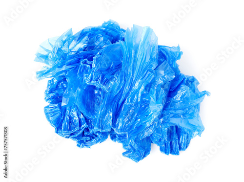 Pile of many blue medical shoe covers isolated on white, top view