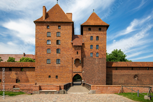 13th century Malbork Castle, medieval Teutonic fortress on the River Nogat, Malbork, Poland photo