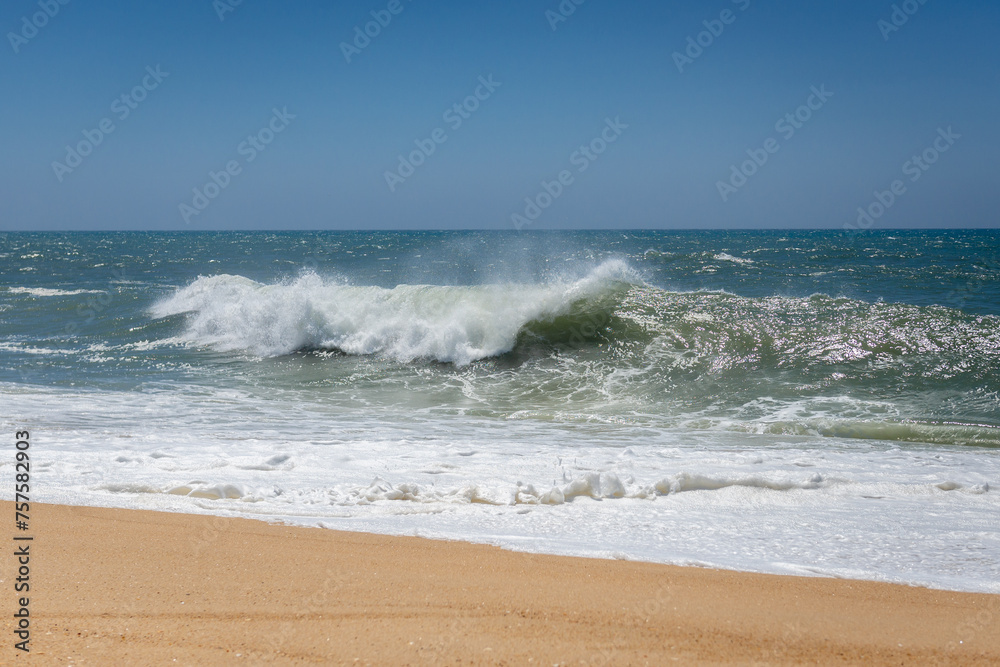Waves seen from North Beach famous for giant waves in Nazare town on so called Silver Coast, Oeste region of Portugal