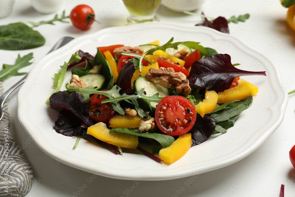 Tasty fresh vegetarian salad on white marble table, closeup Tasty fresh vegetarian salad on white marble table, closeup