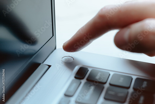 Obraz na płótnie Man touching Laptop fingerprint reader. Scan finger to log into account. Access w salonie