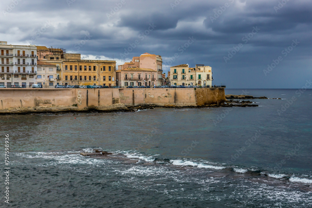 Buildings on Ortygia island, historic part of Syracuse, Sicily Island, Italy Buildings on Ortygia island, historic part of Syracuse, Sicily Island, Italy