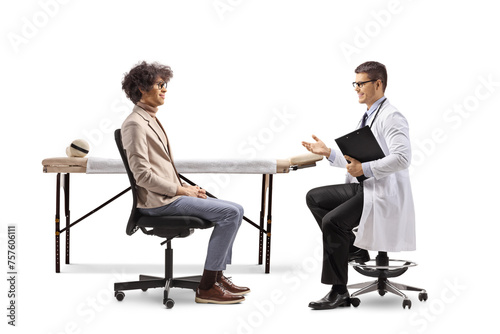 Profile shot of a man sitting and listening to a doctor