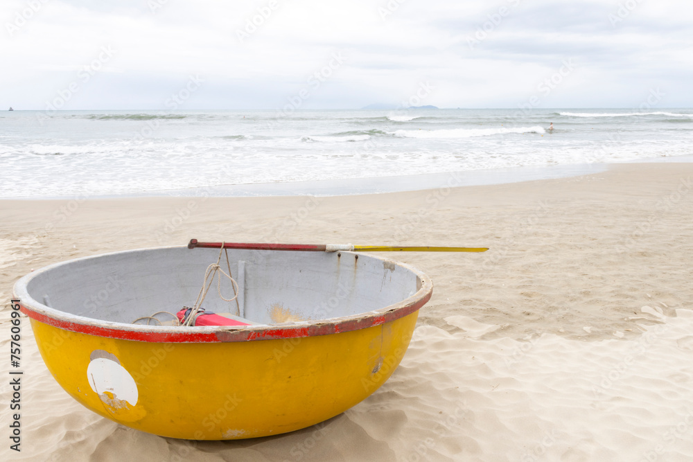 Coconut basket boat on My Khe Beach in Danang, Vietnam