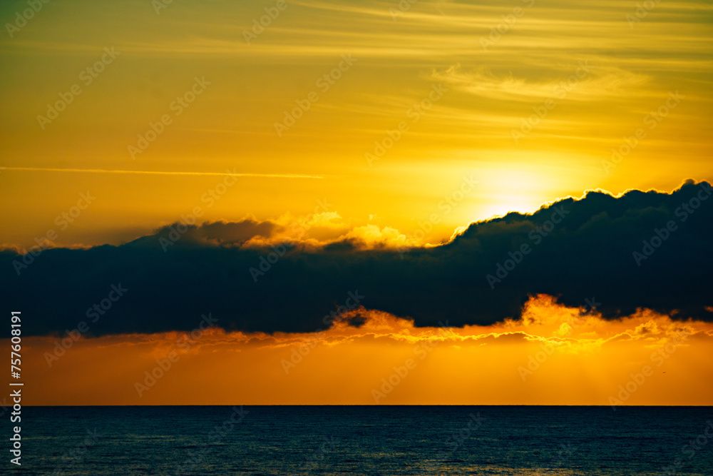 Sunrise over sea water