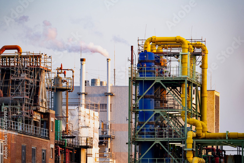 modern chemical plant in Frankfurt, Germany, factory with steam coming out of chimney, complexity of chemical industry, global warming, production and innovation drives global economy