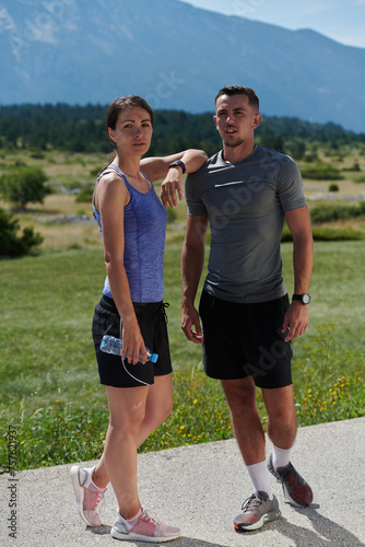 After-Run Relaxation: Romantic Couple Rests Following Intense Training Session.