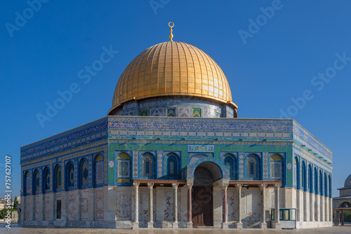 Dramatic image of the famous Temple Mount in Jerusalem, Israel with sunlit golden dome.