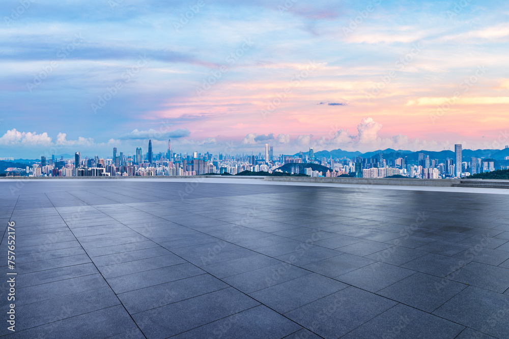 Empty square floors and city skyline with modern buildings scenery at dusk in Shenzhen
