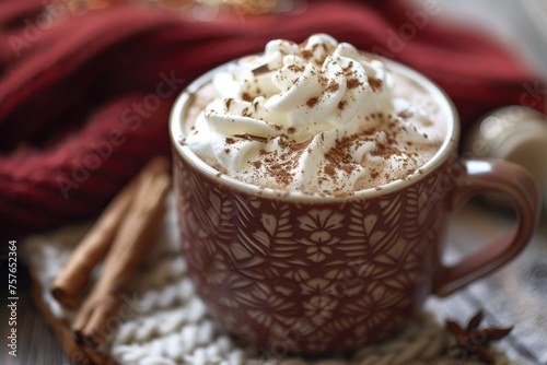 A cozy mug of hot chocolate topped with whipped cream and cinnamon