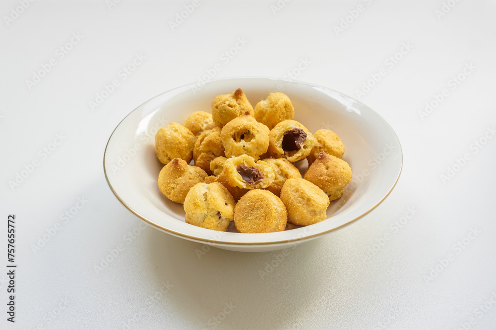 Kue Soes Kering, delicious cheese soes cookies with chocolate paste Kue Soes Kering, delicious cheese soes cookies with chocolate paste