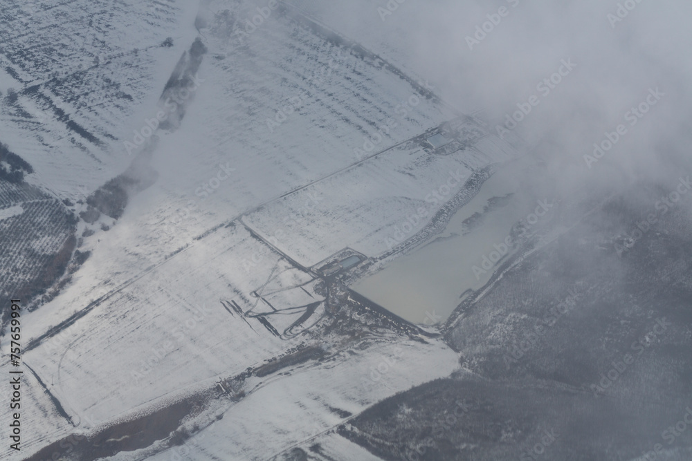 Aerial photography. Europe. Moldova, view from the airplane window. Winter panorama. Aerial photography. Europe. Moldova, view from the airplane window. Winter panorama.