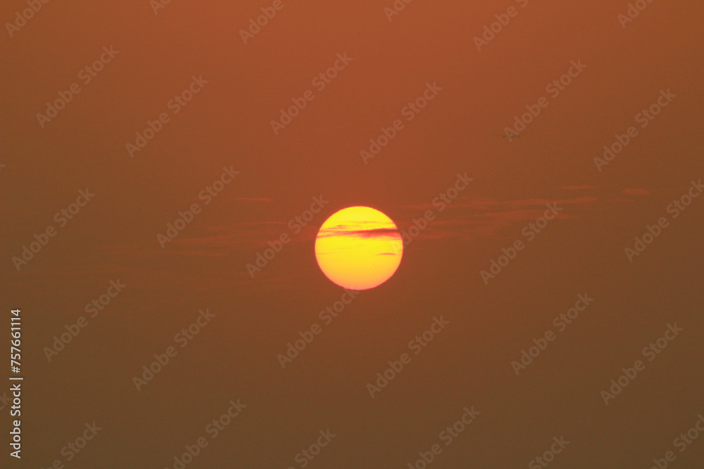 an orange color of sunset at hk