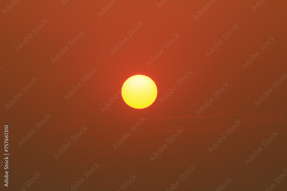 an orange color of sunset at hk
