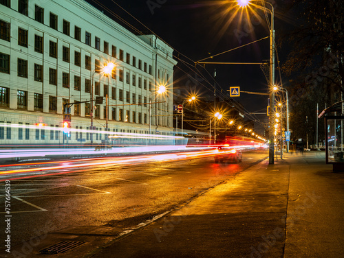 long exposure tram in a blurry form in the night city center , Moscow, Russia. low light shoot