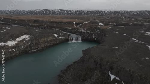 Aerial video of the amazing Gulfus Falls in Iceland. in winter in the snow photo