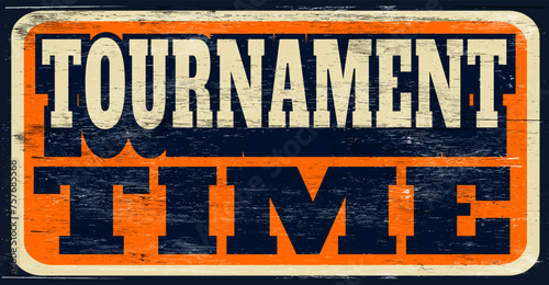 Aged and worn vintage tournament time sign on wood