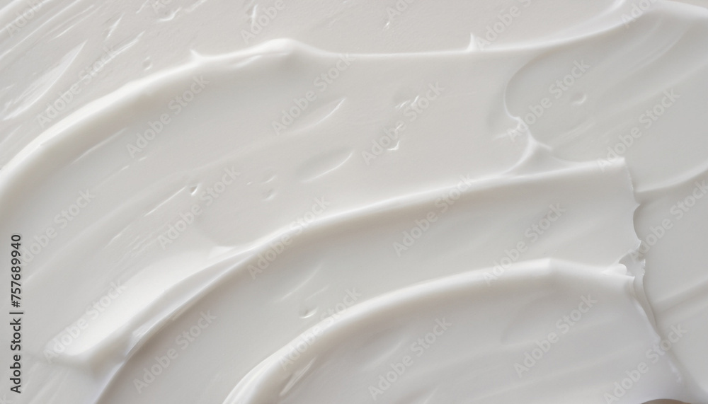The white surface of the cream lotion softens the background., texture, top view, close up The white surface of the cream lotion softens the background., texture, top view, close up