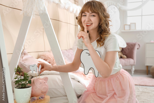 Tooth Fairy with piggy bank...