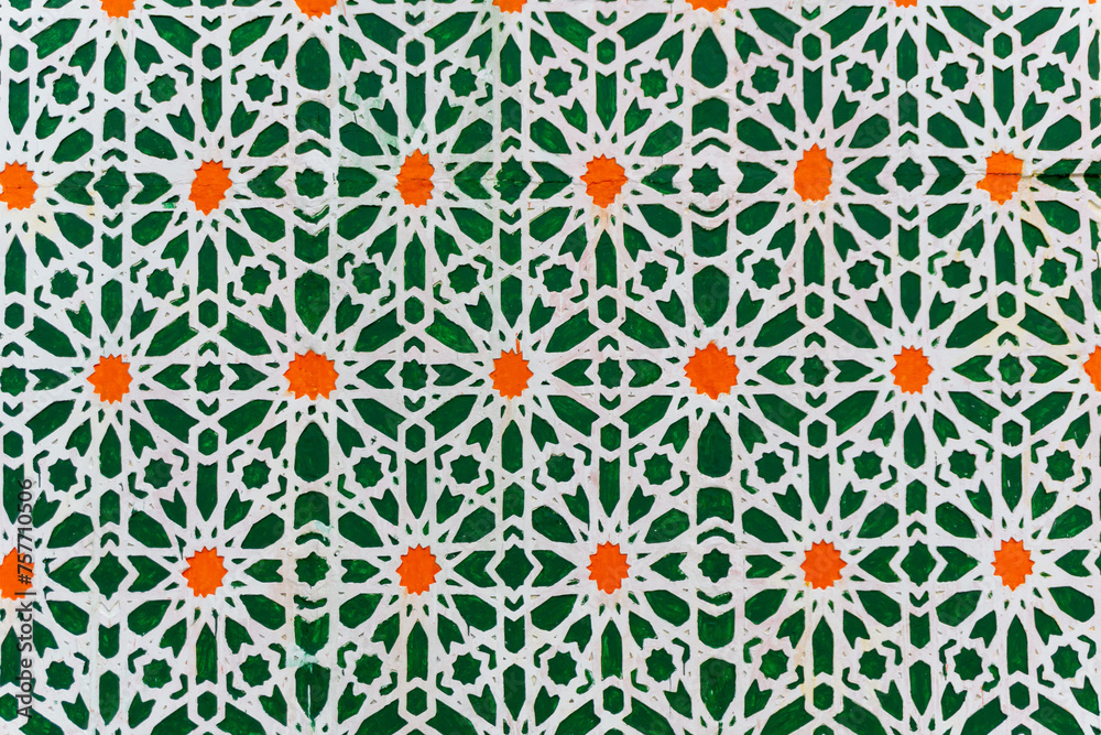 Green wall with Islamic pattern. star seamless pattern on the wall.