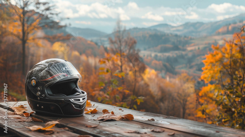 A helmet on table with leaf.